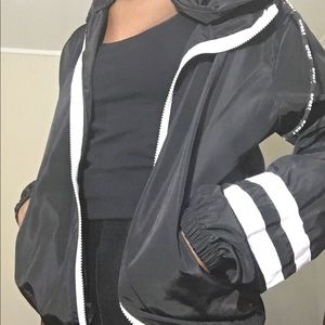 black windbreaker